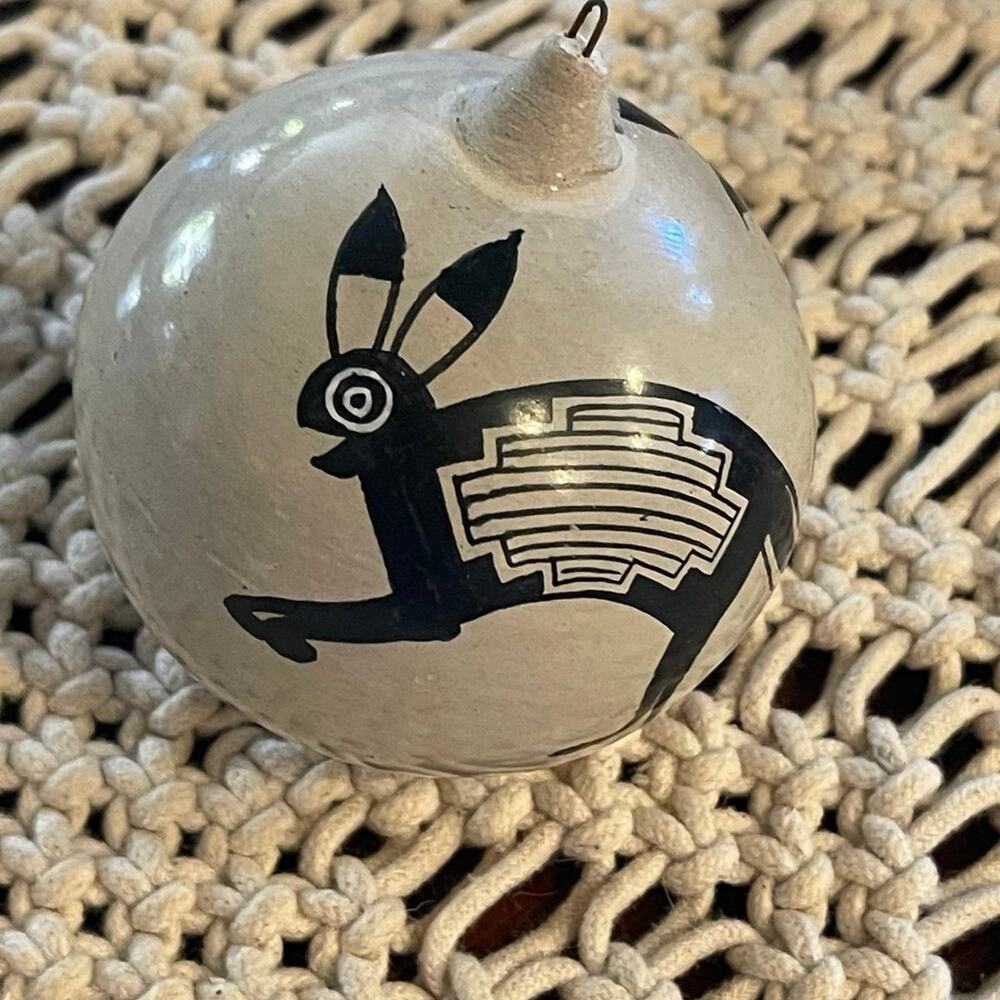 Pottery Christmas ornament handpainted and signed